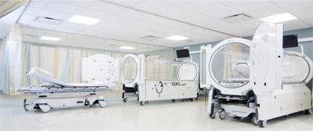 Modern medical imaging room with CT scanners and equipment in a clinical hospital setting